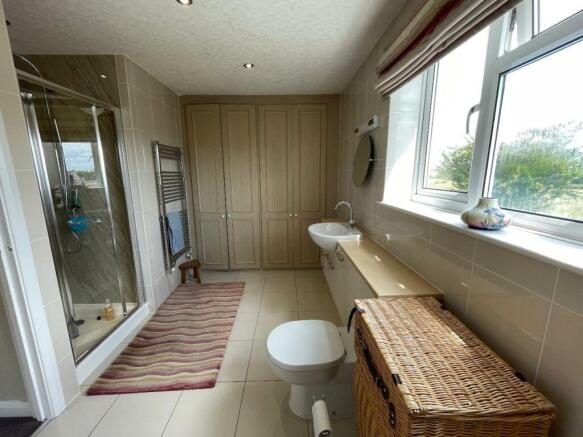 EN-SUITE SHOWER ROOM.W.C.