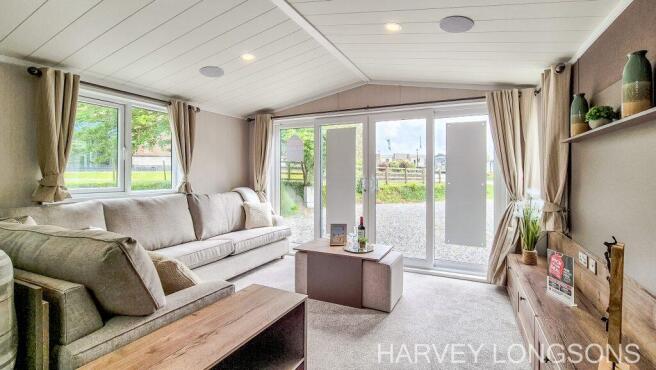 Spacious lounge with French doors in Swift Faygate