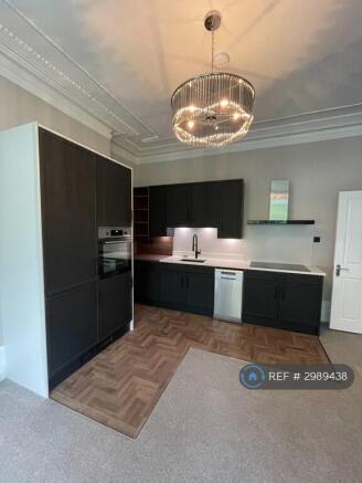 Open Plan Lounge With Top Of The Range Kitchen