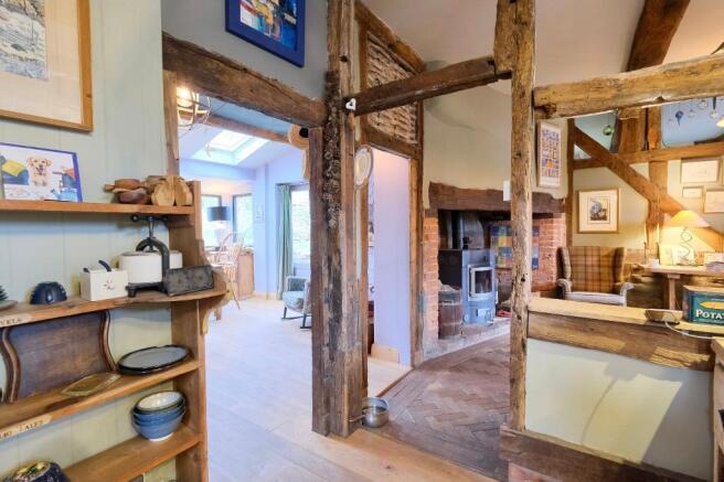 Kitchen through to snug & garden room