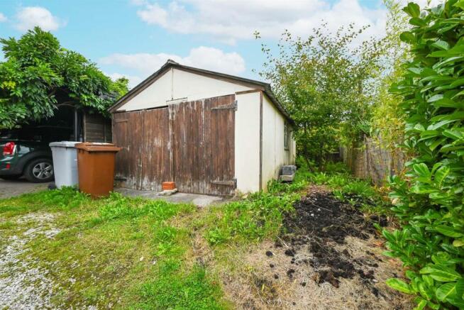 Detached garage to rear