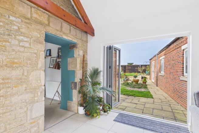 Bi-Fold doors lead out to the garden