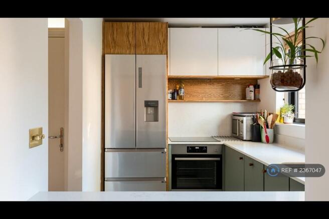 Modern Fitted Kitchen With Stone Worktops
