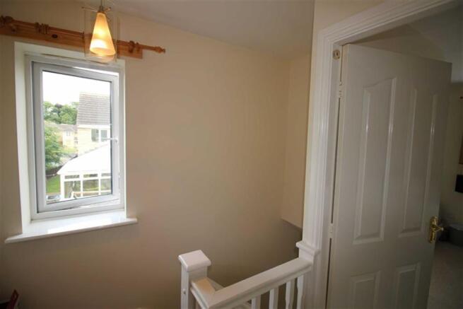 TO THE FIRST FLOOR LANDING