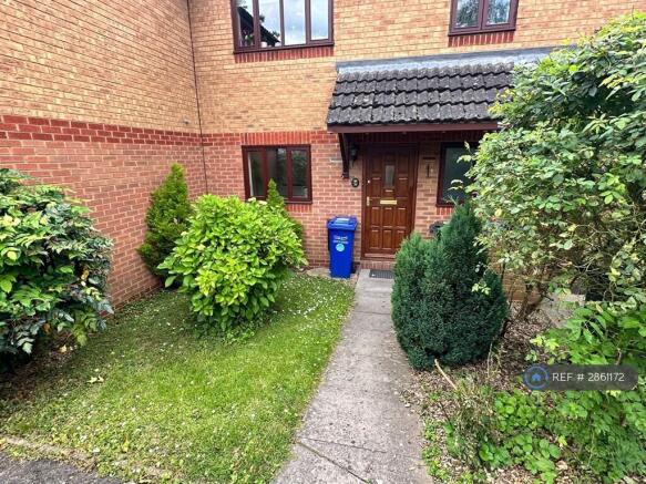 Front Door And Small Grassed Garden