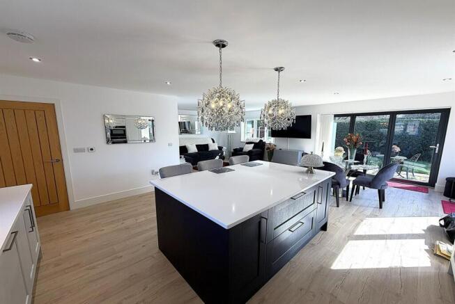 Modern open-plan kitchen with stylish island...