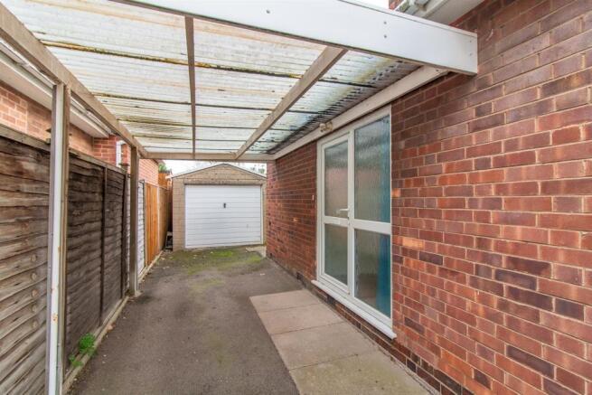 Car Port & Detached Garage
