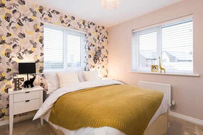 Bedroom 3 welcomes plenty of natural light