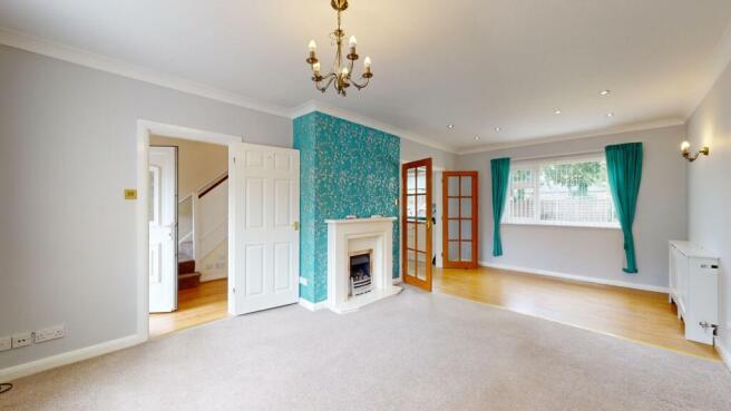 THROUGH LOUNGE/DINING ROOM