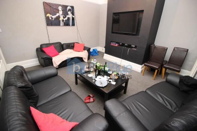 Comfortable communal lounge featuring multiple ...