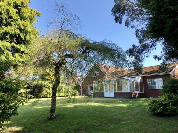 Rear garden side angle to the property .jpg