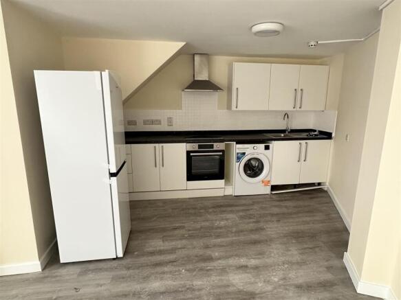 Modern kitchen with integrated appliances...