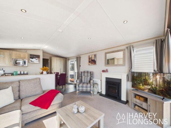 Modern living room with fireplace in Carnaby lodge