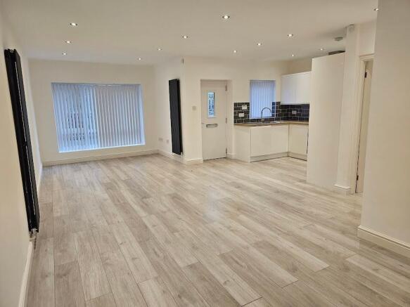 Spacious open-plan living with modern kitchen...