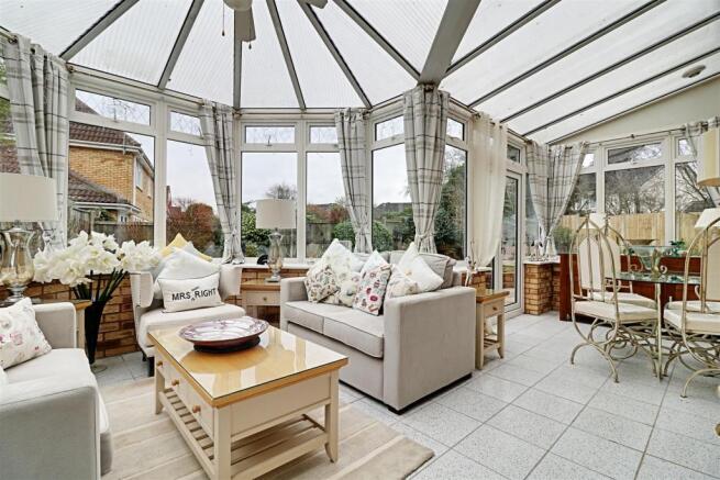 'L' SHAPED CONSERVATORY measuring