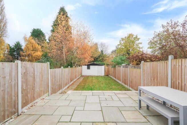 Sunny, private rear garden with paved patio are...