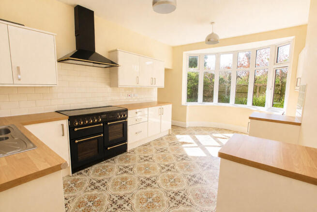 Sunlit kitchen wi...