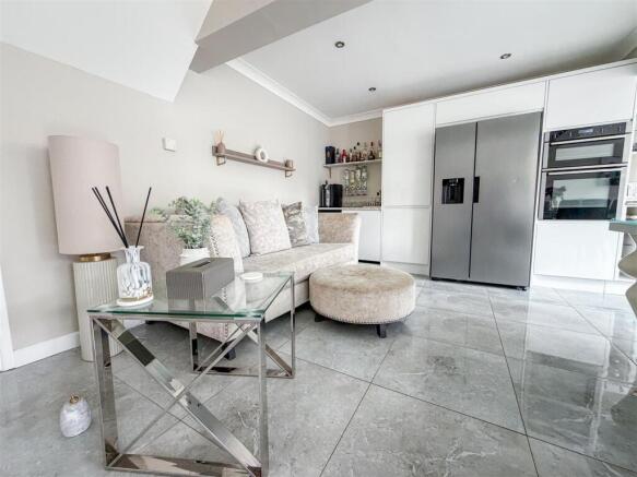 ALTERNATE VIEW OF KITCHEN/DINER/FAMILY ROOM