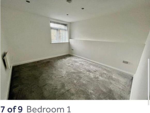 Bright, freshly painted bedroom with new carpet...