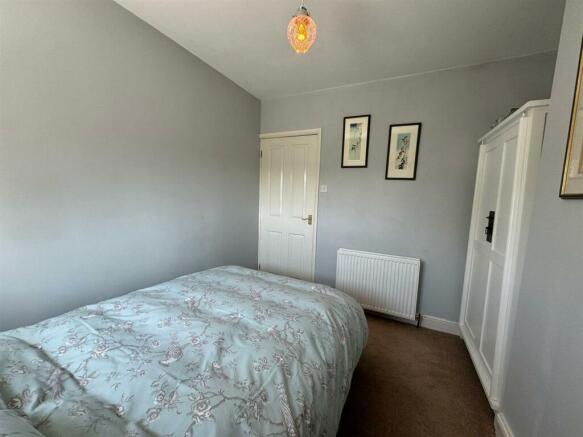 BEDROOM 1 (REAR)