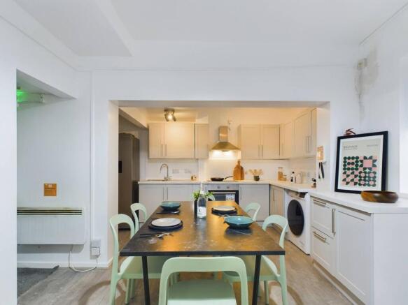 Bright, modern open-plan kitchen and dining are...