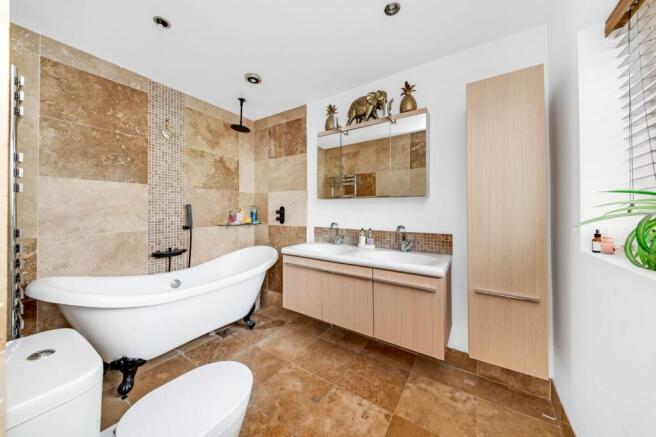 BEDROOM ONE EN-SUITE BATHROOM