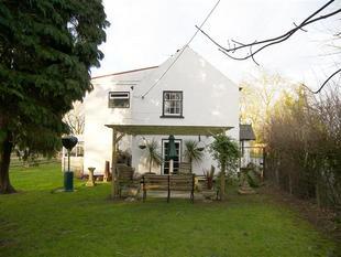 GARDEN TO FRONT, SIDE AND REAR