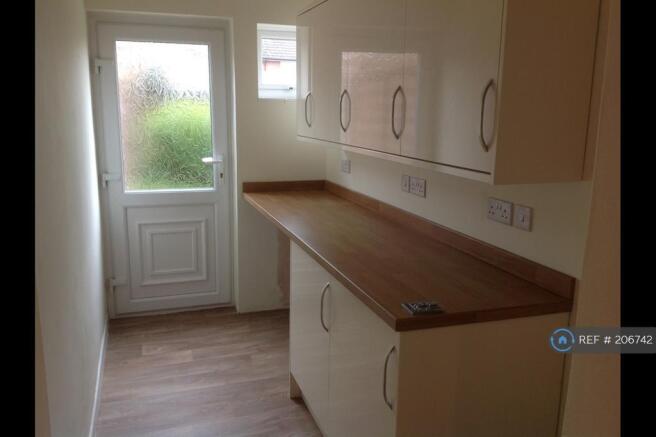 Utility Room With Access To Rear Garden
