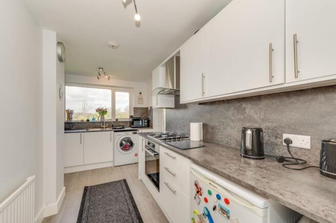 THROUGH SITTING/DINING ROOM AND KITCHEN