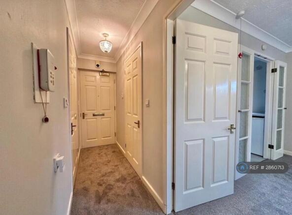 Hallway With Storage Cupboard