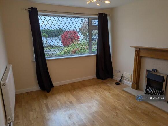 Front Room With Electric Fireplace