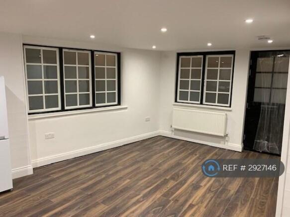 Living Room And Open Plan Kitchen