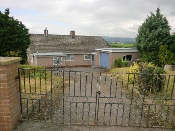 Rear access with garage and parking