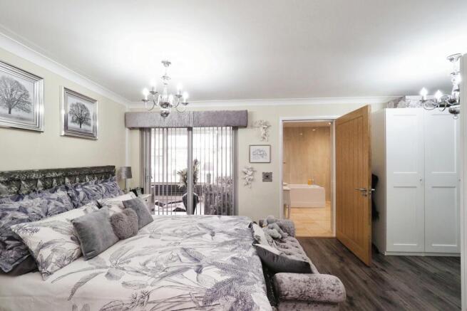 Main Bedroom with dressing area and private en suite bathroom (potential for another bedroom?)