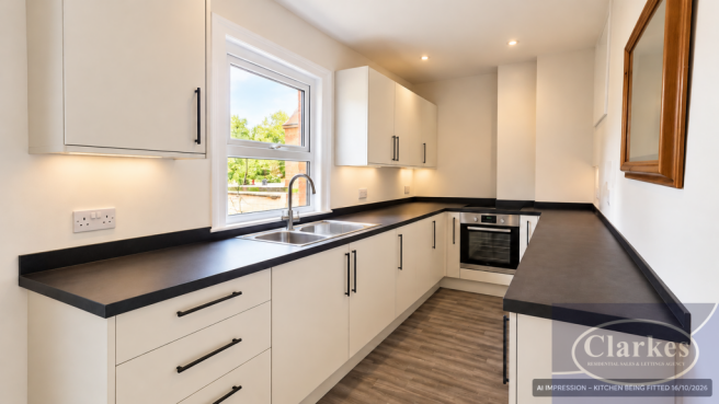 Modern Minimalist Kitchen with Black Countertops