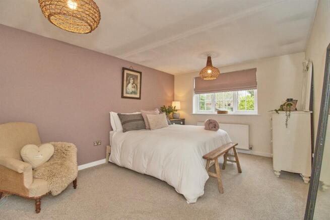 BEDROOM ONE TO REAR