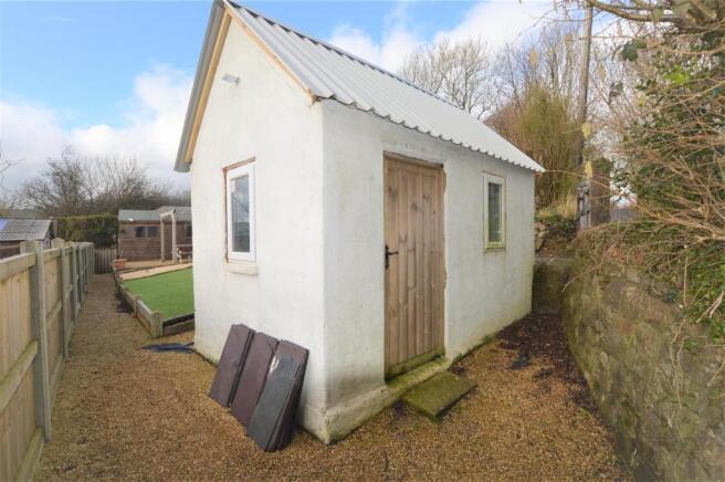 EXTERNALLY-TRADITIONALLY BUILT OUTBUILDING