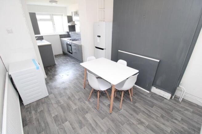 Modern open kitchen with stylish dining area...