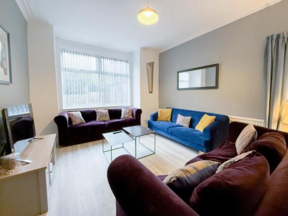 Bright, modern lounge with comfy sofas...