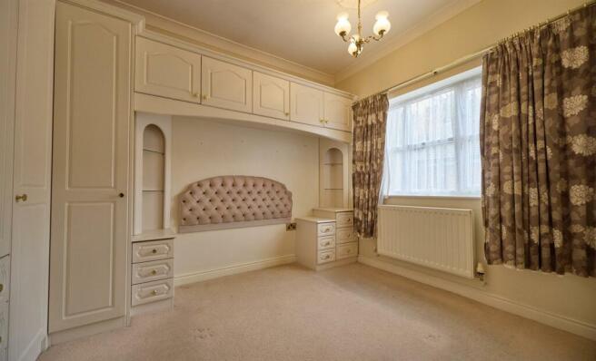 BEDROOM ONE TO FRONT