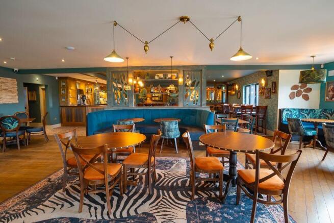 Restaurant and bar with stylish seating at Rye Har