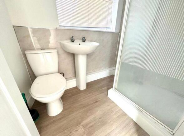 A modern and clean bathroom featuring a refresh...
