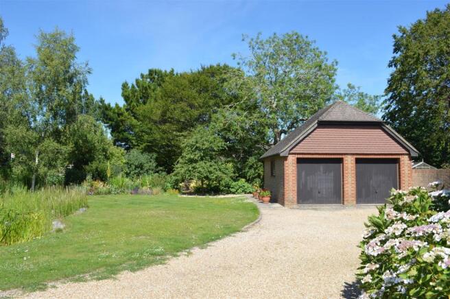 DRIVE WAY & DETACHED DOUBLE GARAGE