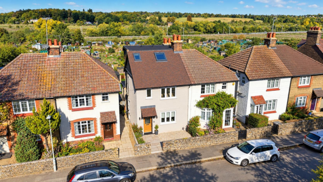 Sunny Edwardian Street with Countryside Views.png
