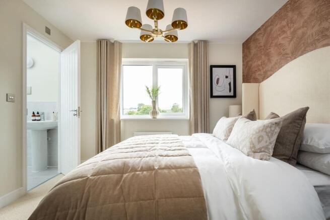 The main bedroom benefits from an en suite shower room