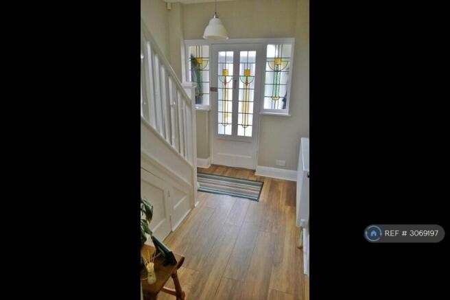 Entrance Featuring Original Stained Glass
