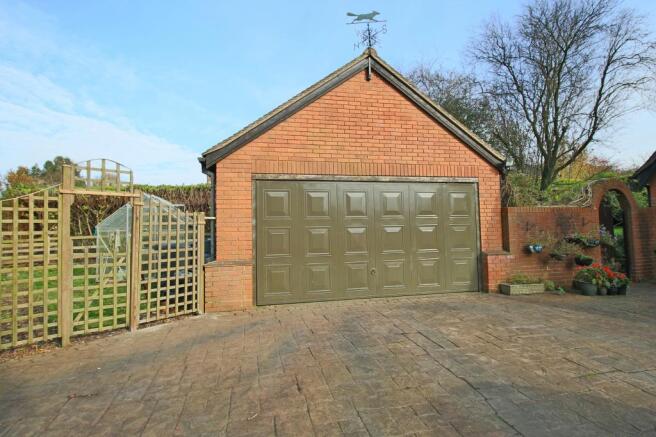 Double Garage & Side Garden