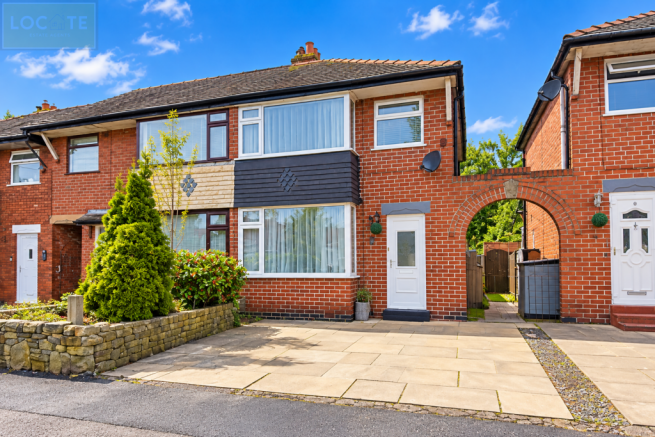 Sunny Red-Brick Suburban House