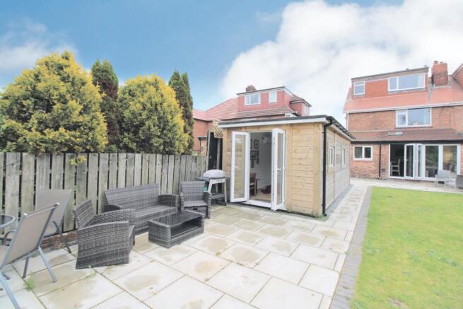 Garden room with patio area
