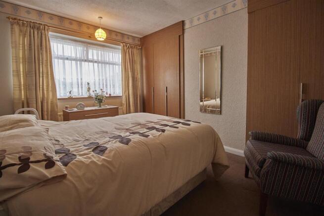 FRONT BEDROOM ONE